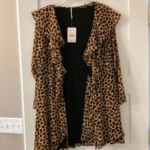 Free people adorable leopard wrap dress never been worn